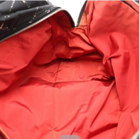 CHANEL Black Quilted Travel Bag with Diamond Pattern - Picture 5 of 16